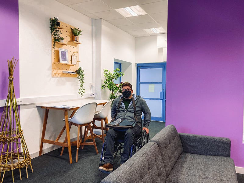 Dean in his wheelchair at the This Is Me offices