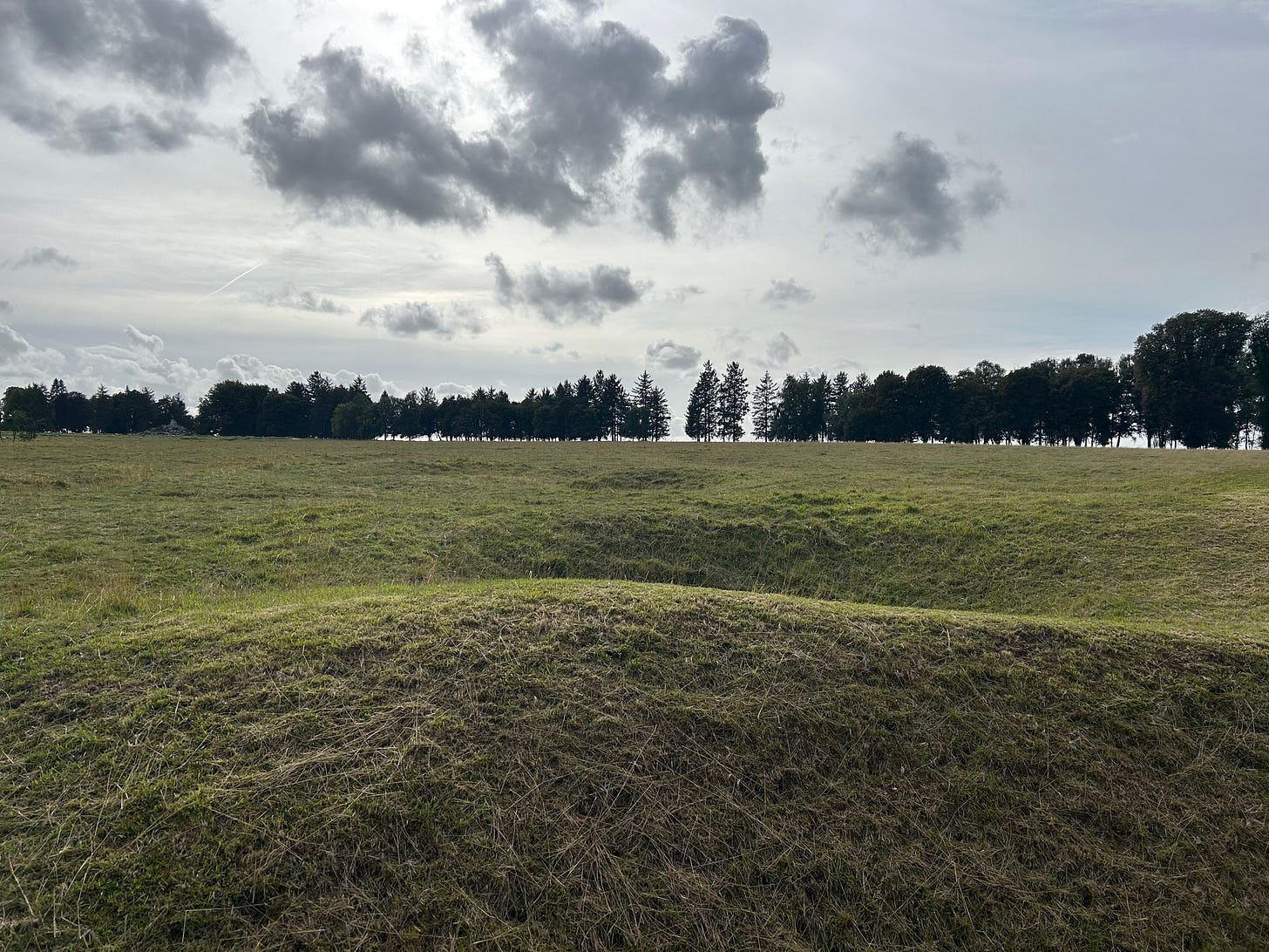 May be an image of grass, golf course and horizon May be an image of grass, golf course and horizon