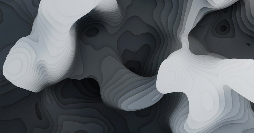 a black and white abstract background with wavy shapes