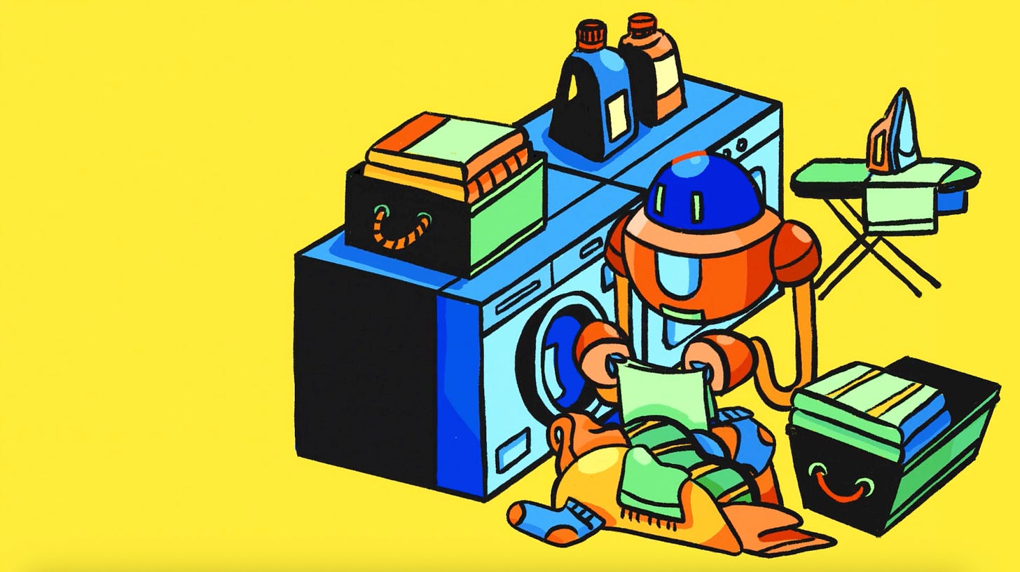Illustration of an orange and blue humanoid robot with a rounded blue head kneeling beside a washing machine, pulling clothes out of the open drum. A laundry basket sits to its right, and the top of the washer holds folded towels and two bottles of detergent. An ironing board with an iron rests in the background. The scene is set against a solid bright yellow background, in a flat cartoon illustration style. Illustration of an orange and blue humanoid robot with a rounded blue head kneeling beside a washing machine, pulling clothes out of the open drum. A laundry basket sits to its right, and the top of the washer holds folded towels and two bottles of detergent. An ironing board with an iron rests in the background. The scene is set against a solid bright yellow background, in a flat cartoon illustration style.