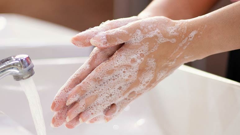 washing hands with cold water