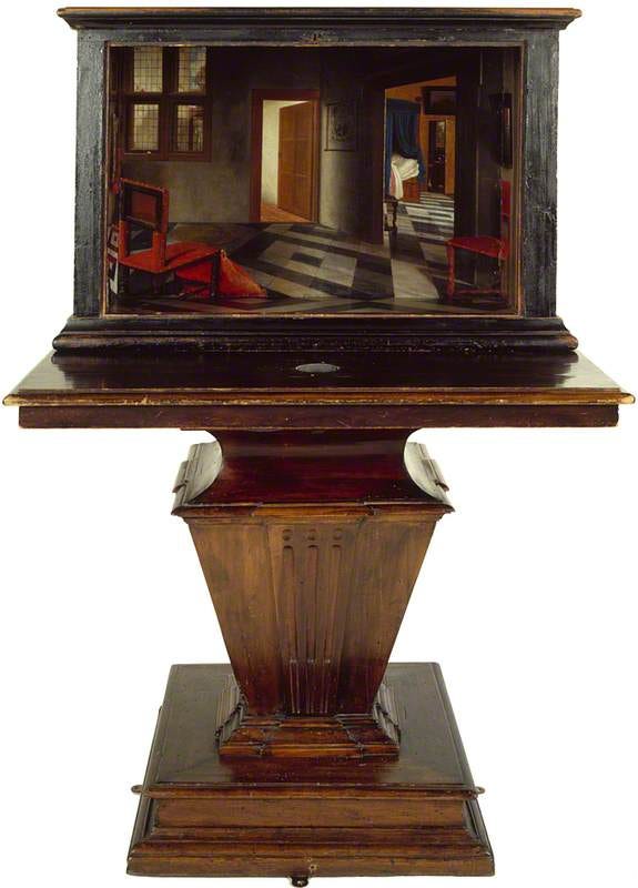 A painted wooden box that resolves into a perfect house through a peephole A painted wooden box that resolves into a perfect house through a peephole
