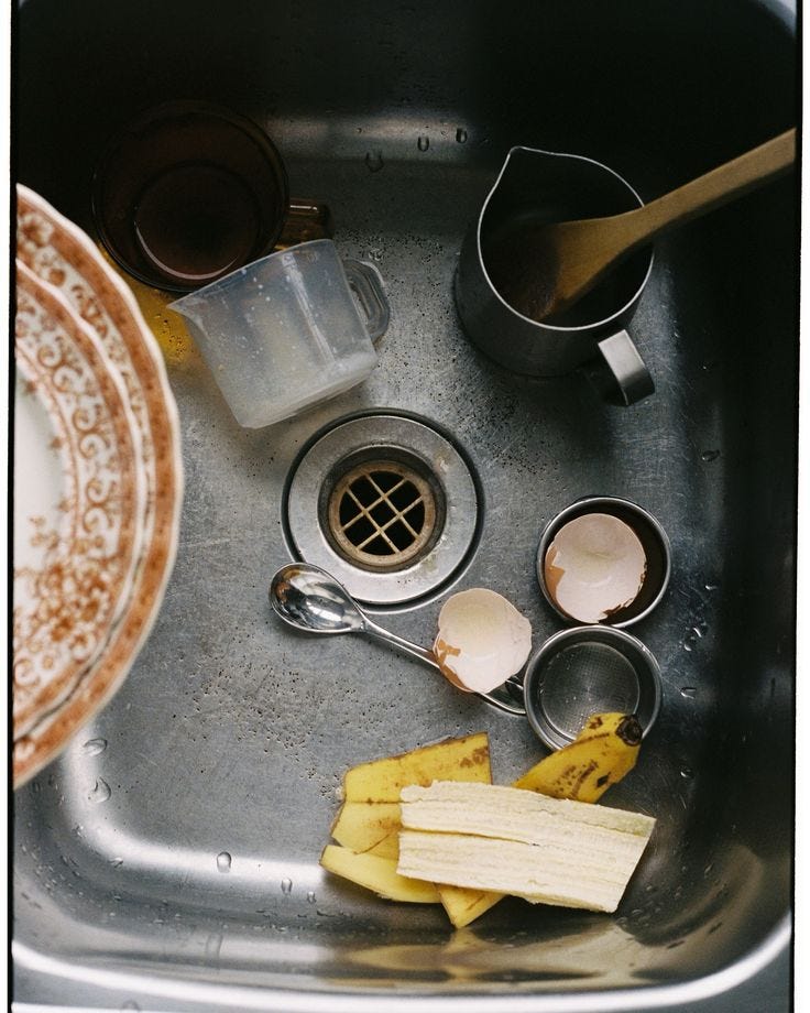 This may contain: there are many items in the sink to be used for baking and other cooking purposes This may contain: there are many items in the sink to be used for baking and other cooking purposes