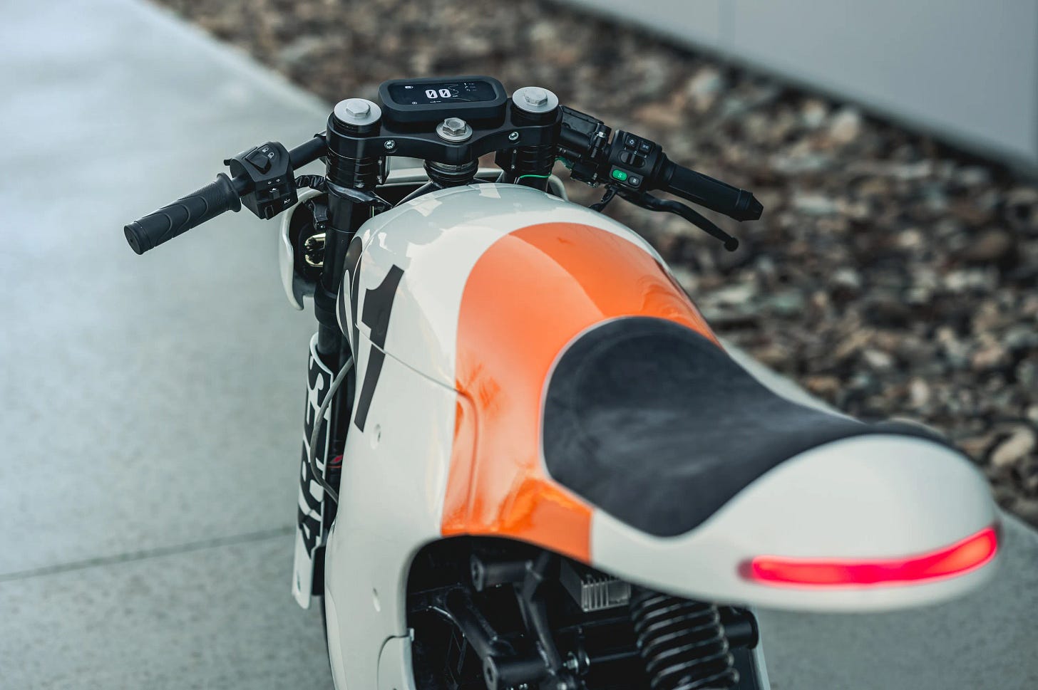 Handlebars and seat view of electric motorcycle