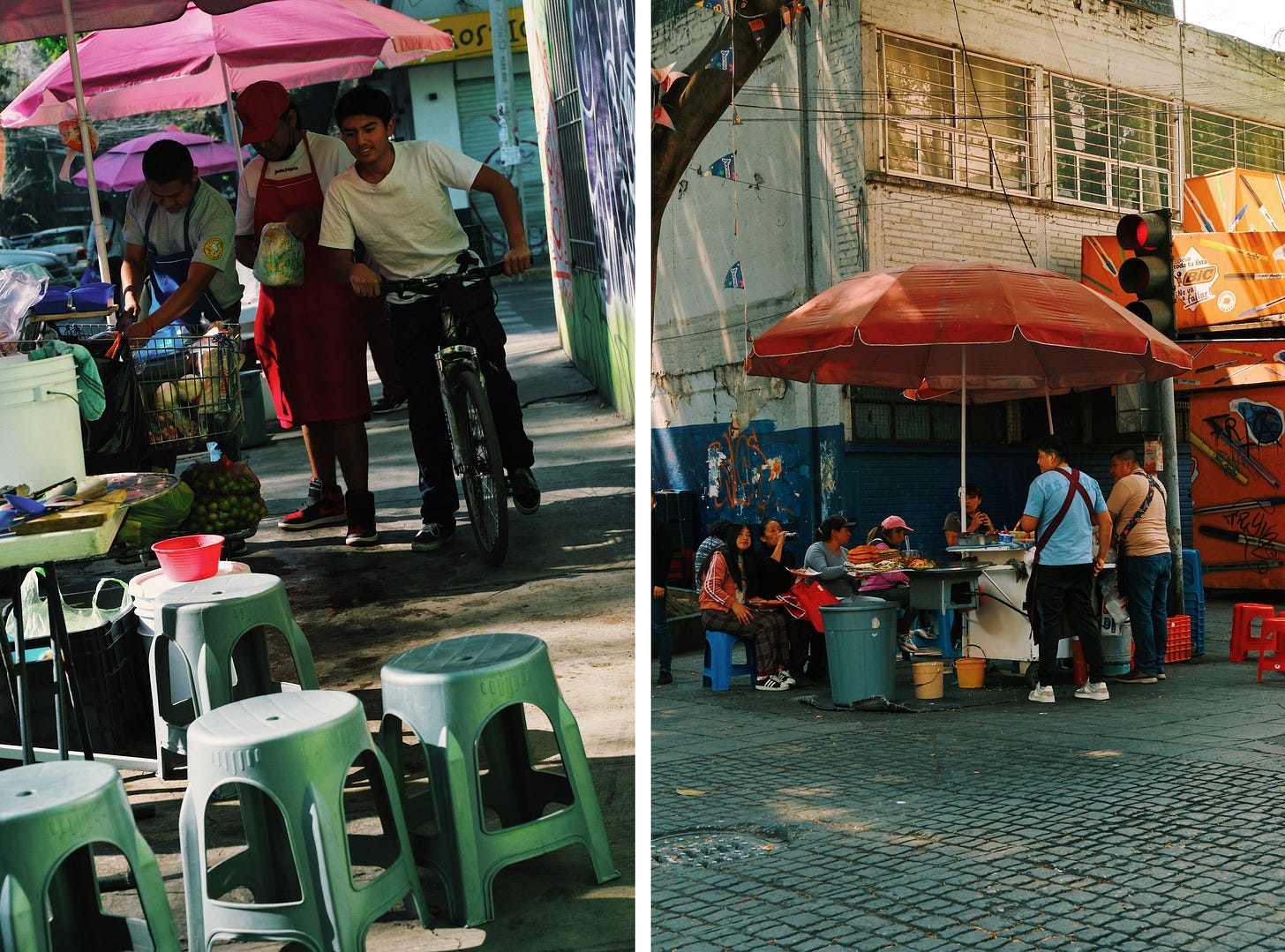 A cyclist passes between a food vendor in a red apron and green plastic stools on a Mexico City sidewalk alongside a street corner where a group gathers around a food stall under a red umbrella.