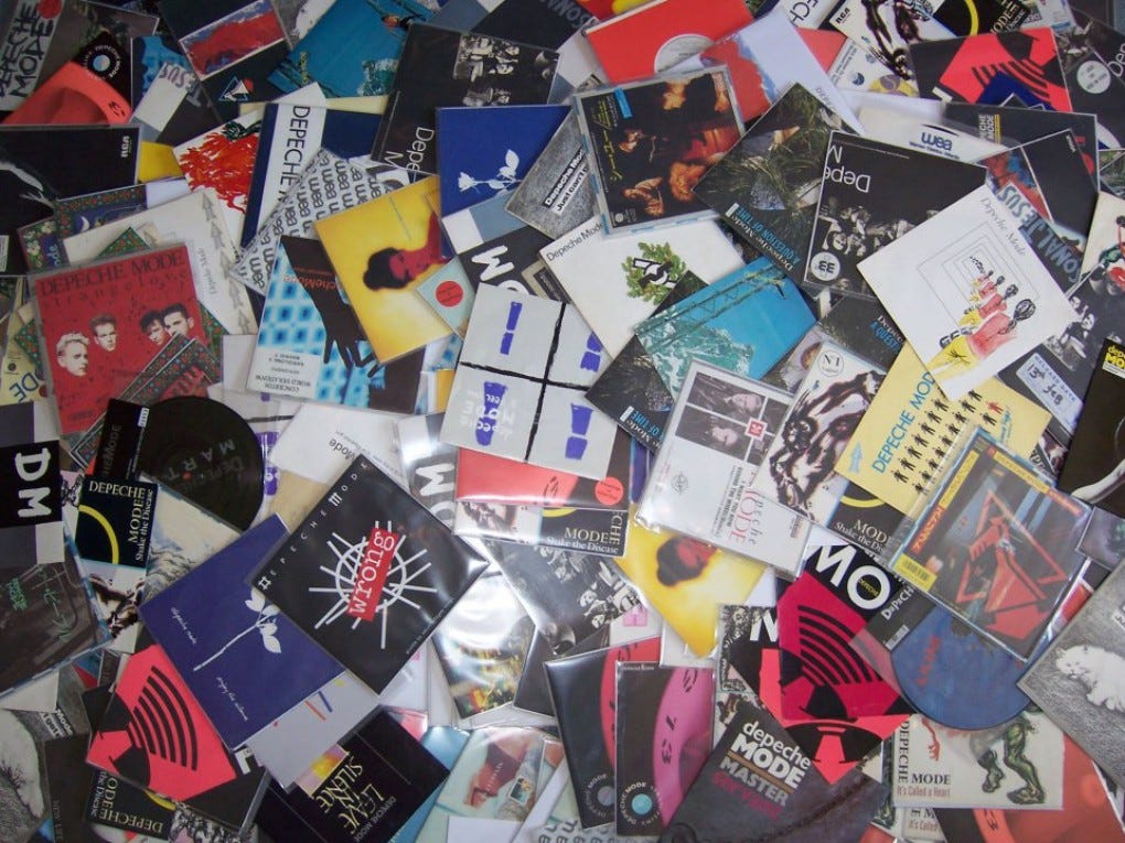 A heap of Depeche Mode records in a haphazard pile A heap of Depeche Mode records in a haphazard pile