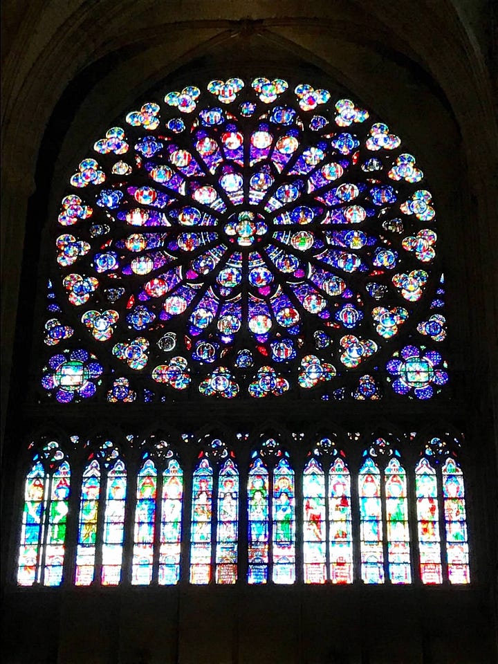 A picture of a neon-lit elevator and several of Notre Dame