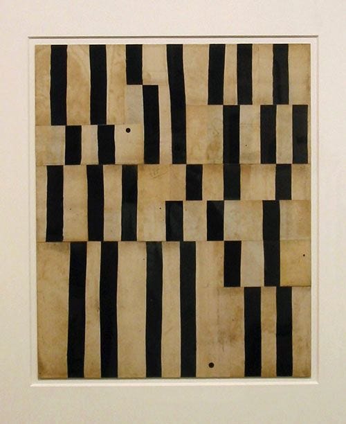 This may contain: black and white squares are arranged in an abstract pattern with vertical stripes on the surface