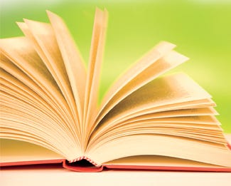 Front matter appears in all books, including the hardcover in this image. Front matter appears in all books, including the hardcover in this image.