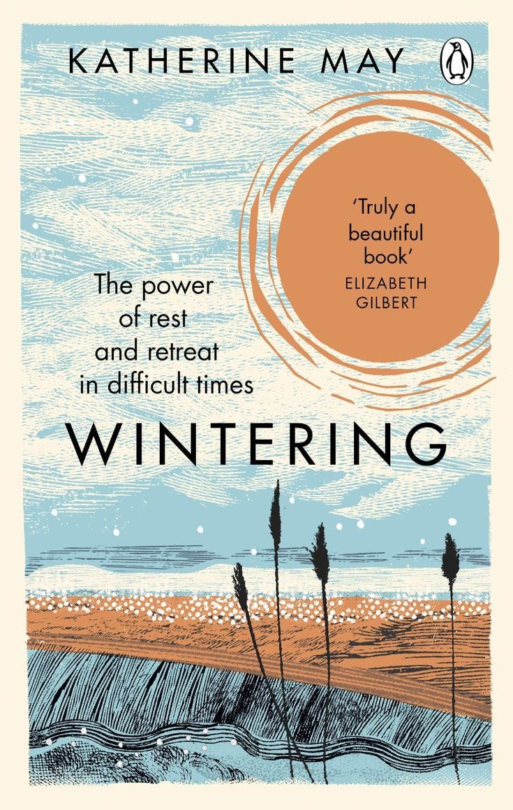 This may contain: a book cover with an orange circle above it and the words wintering written in black