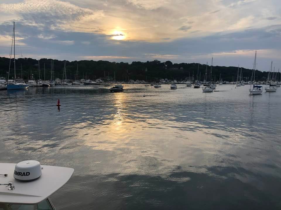 May be an image of boat, ocean, twilight and horizon