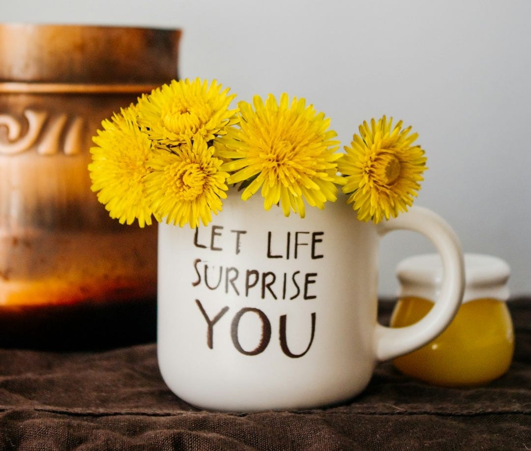 white ceramic mug with yellow flowers white ceramic mug with yellow flowers