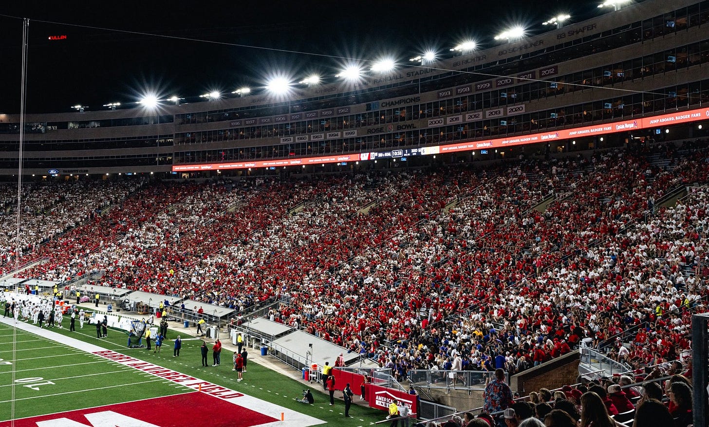 Fans fill the stands at Camp Randall Stadium during a Wisconsin football game at night. Fans fill the stands at Camp Randall Stadium during a Wisconsin football game at night.