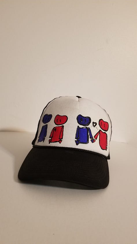 a cartoon robot drawn and painted on many surfaces.