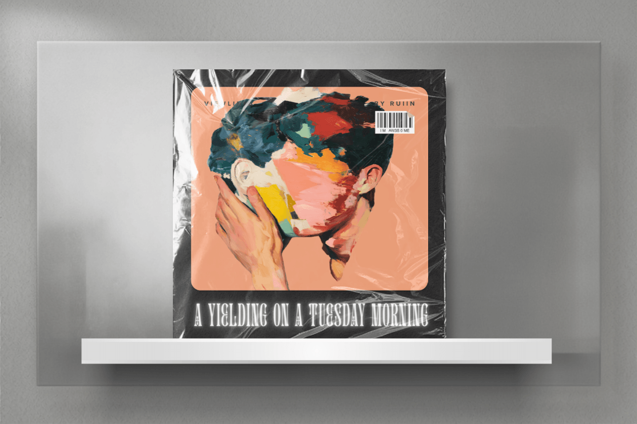 A physical album cover enclosed in protective, wrinkled plastic wrap, displayed on a sleek white shelf against a textured, light gray archival panel. The jacket art features a minimalist layout with a rounded square frame containing a soft, pink-toned, surreal illustration of two men holding their faces close. A barcode sticker sits in the top right corner, and distorted, glowing white serif typography at the bottom reads "A YIELDING ON A TUESDAY MORNING." Part of the Viewlines series at The Subtext Review.