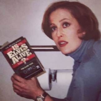 A person holding a book

AI-generated content may be incorrect.