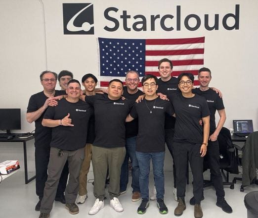 Starcloud engineers and cofounders standing beneath the company sign.