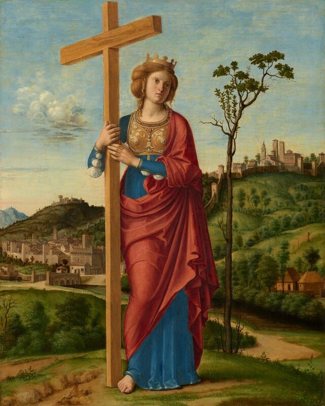 A pale-skinned woman stands holding a cross in front of a deep landscape in this vertical painting. The woman’s body faces us but she tips her head to our right and looks off in that direction with light brown, wide-set, large eyes. She has a long, straight nose, pale pink lips, and a square jawline. Her thick blond hair is pulled back and curls fall alongside her face and fall down to her shoulders. She wears a gold crown and gold breastplate ornamented with pearls and gems. Her lapis-blue gown is slit along the long sleeves and puffs of white linen are pulled through the openings. A carnation-red robe drapes over one shoulder and across her hips. She is barefoot, and both hands brace the tall cross to her right, our left. A tall, spindly tree with only a few leaves in its sparce canopy stands just behind her to our right. She stands on a grassy hill, and a path leads back to a town. More grassy, tree-lined hills behind her rise to another town outlined against the pale blue sky. A few clouds trundle across the sky and more are streaked across the pink horizon, which comes about halfway up this composition. A pale-skinned woman stands holding a cross in front of a deep landscape in this vertical painting. The woman’s body faces us but she tips her head to our right and looks off in that direction with light brown, wide-set, large eyes. She has a long, straight nose, pale pink lips, and a square jawline. Her thick blond hair is pulled back and curls fall alongside her face and fall down to her shoulders. She wears a gold crown and gold breastplate ornamented with pearls and gems. Her lapis-blue gown is slit along the long sleeves and puffs of white linen are pulled through the openings. A carnation-red robe drapes over one shoulder and across her hips. She is barefoot, and both hands brace the tall cross to her right, our left. A tall, spindly tree with only a few leaves in its sparce canopy stands just behind her to our right. She stands on a grassy hill, and a path leads back to a town. More grassy, tree-lined hills behind her rise to another town outlined against the pale blue sky. A few clouds trundle across the sky and more are streaked across the pink horizon, which comes about halfway up this composition.