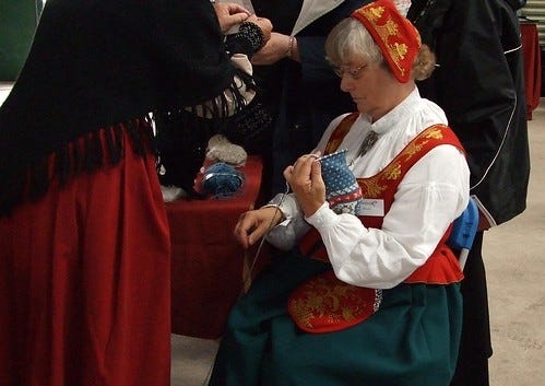 Norwegian knitters in traditional costume Norwegian knitters in traditional costume