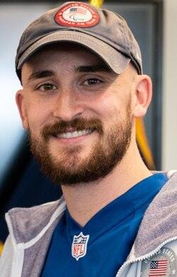 A person with a beard and mustache wearing a hat
AI-generated content may be incorrect. A person with a beard and mustache wearing a hat
AI-generated content may be incorrect.