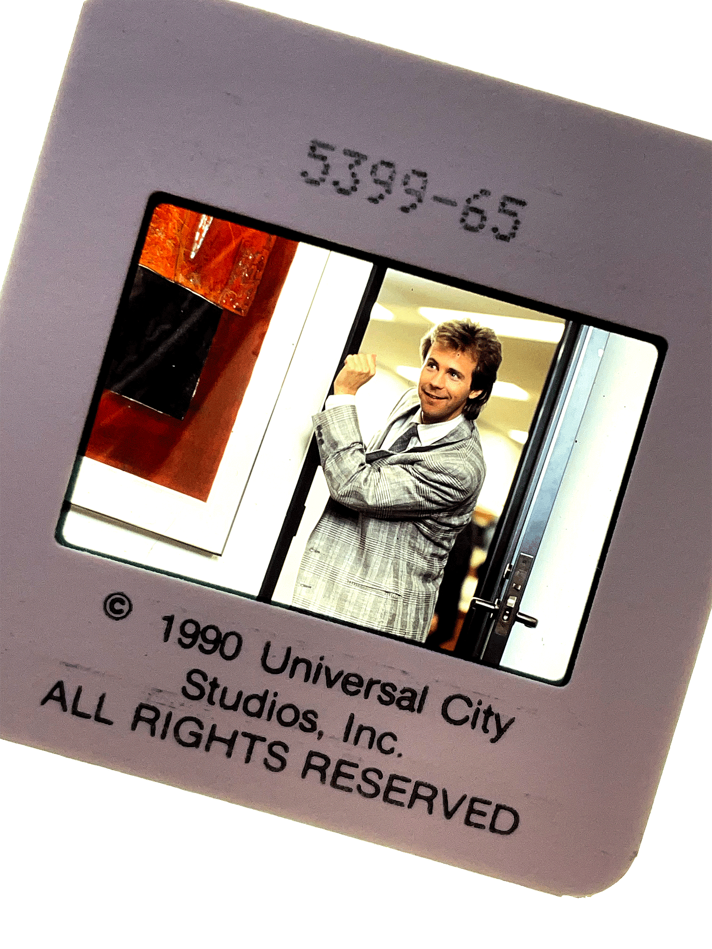 Dana Carvey knocking on the wall as he enters a room in OPPORTUNITY KNOCKS. Press slide. Dana Carvey knocking on the wall as he enters a room in OPPORTUNITY KNOCKS. Press slide.