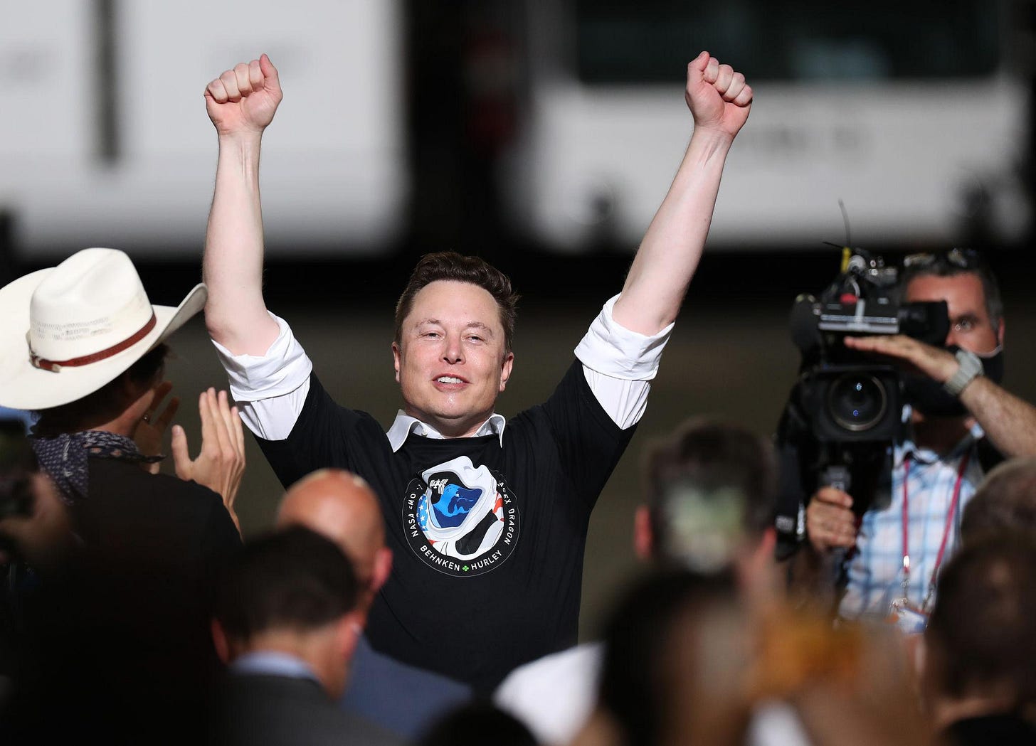 Elon Musk celebrating arms raised at SpaceX Crew Dragon launch, 2020 Elon Musk celebrating arms raised at SpaceX Crew Dragon launch, 2020