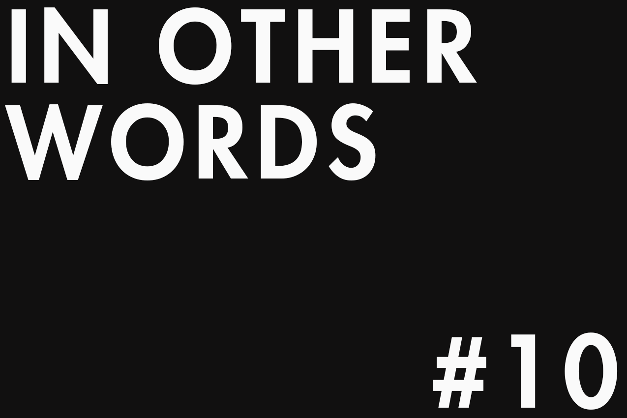 Minimalist typographic image featuring "IN OTHER WORDS" in the top-left corner and "#10" in the bottom-right one. The two elements are separated by negative space in a gallery-style layout. Part of the In Other Words series at The Subtext Review.