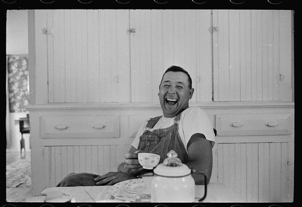 Hansen, Jim, photographer. Willis Cooper laughing and drinking coffee in the kitchen of his farmhouse near Radcliffe, Iowa. Iowa, 1957. Sept. 9 date added to Look's library. Photograph. https://www.loc.gov/item/2009632324/.