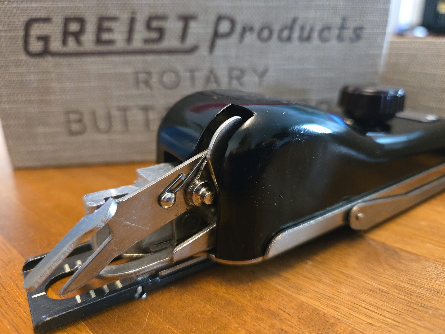 Rotary buttonhole attachment for sewing machine. Made by Greist.