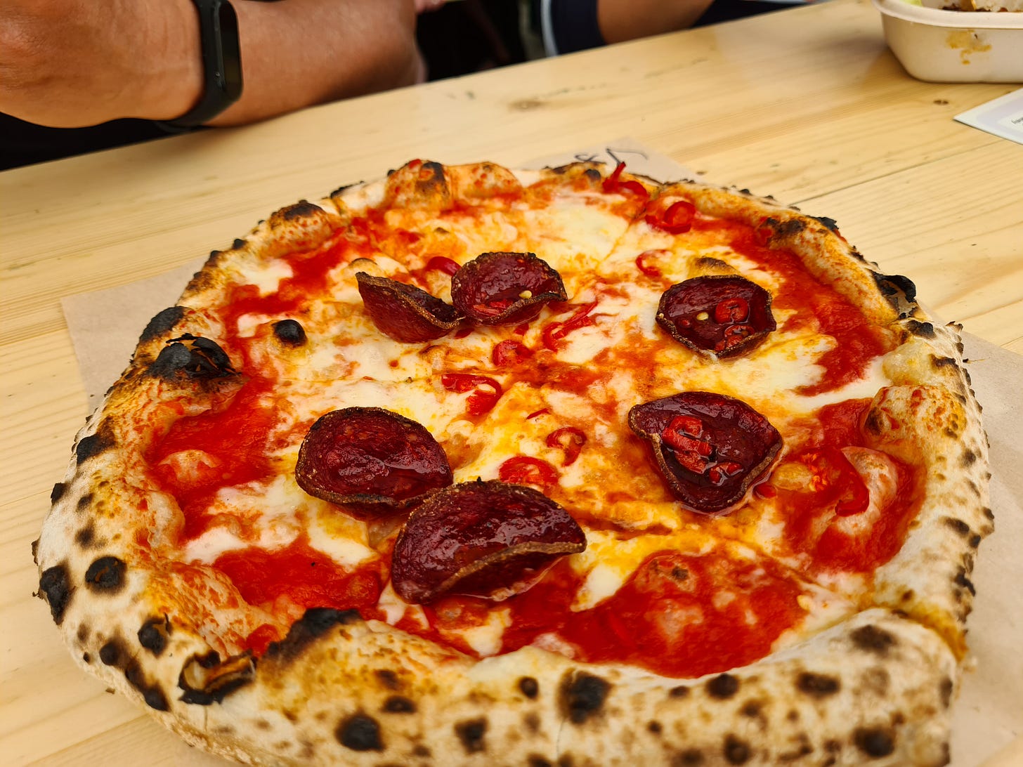 Jiawl bach pizza at Ffwrnes, with pepperoni and red chillies