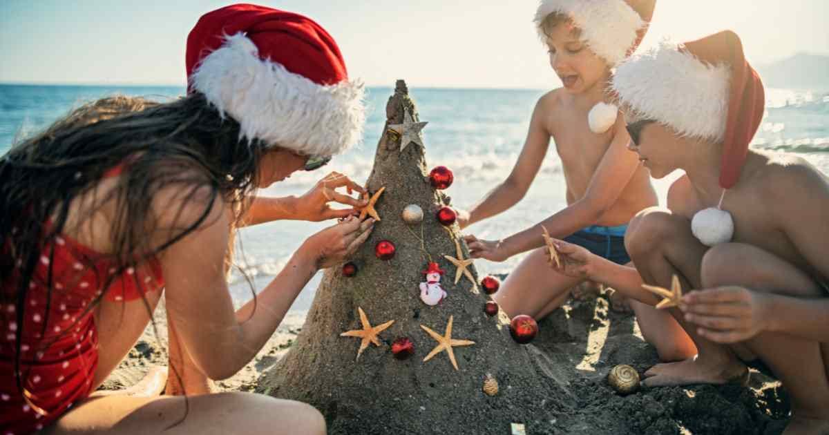 kids on an australian beach at christmas, christmas in australia. kids on an australian beach at christmas, christmas in australia.