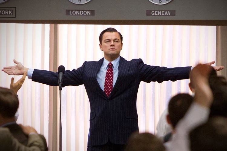 Jordan Belfort (Leonardo di Caprio) striking a pose in a still from The Wolf of Wall Street
