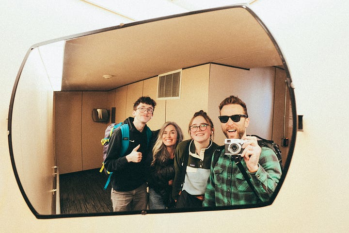 starbucks barista, mirror reflections, man protesting, by Tyler Knott Gregson