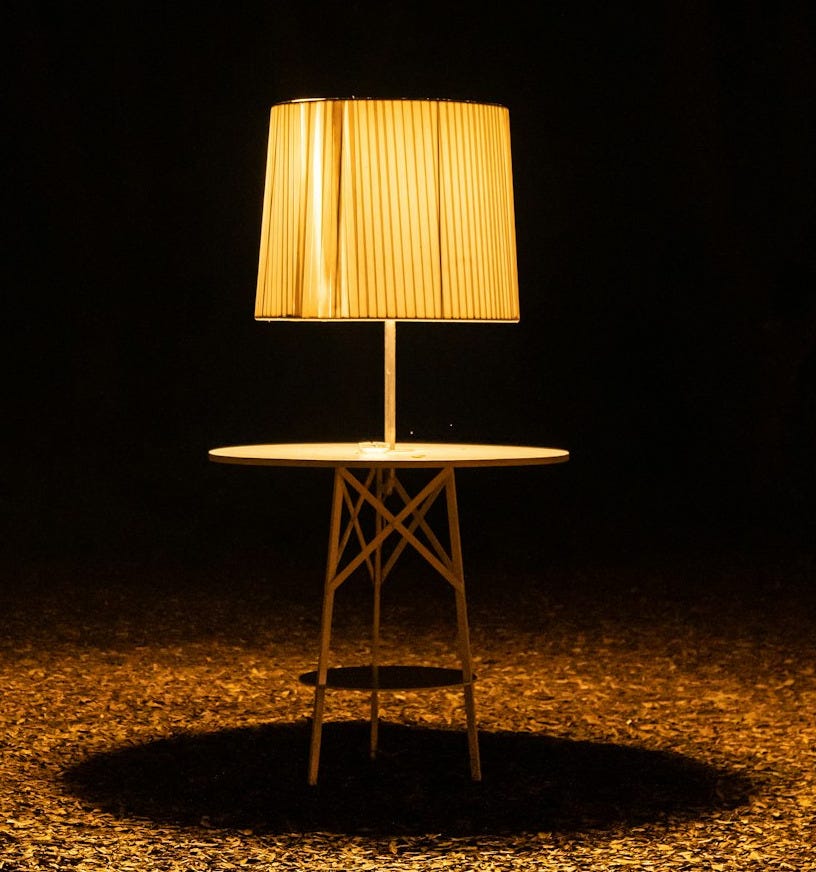 brown wooden chair with brown lampshade