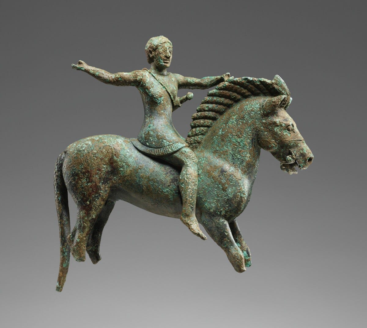 small statue of a horse with a person riding it, with one hand holding its mane and the other hand outstretched small statue of a horse with a person riding it, with one hand holding its mane and the other hand outstretched
