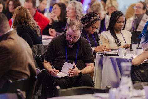 speakers and attendees at elevate