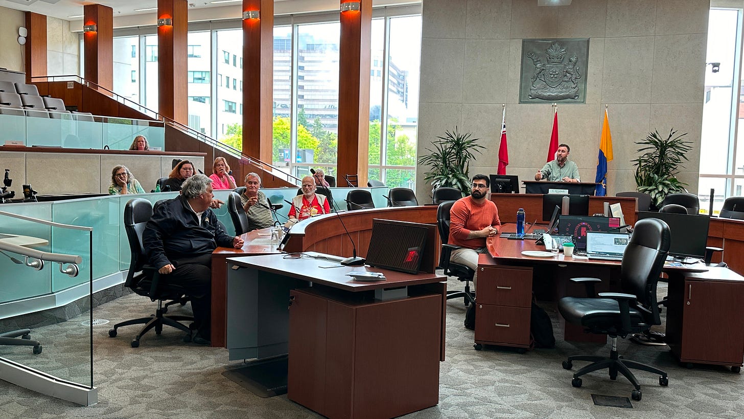 Councillor Kroetsch answering residents questions about concerns in their CityHousing Hamilton buildings