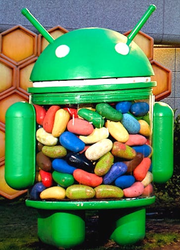 Android Jelly Bean statue upright, not tipped over, beans not spilled.
