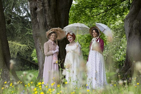 Models in regency dress enjoy the accomodations at the Gainsborough Bath Spa, high tea, a chat beside the spa, a walk through Bath, lounging on a shady Georgian stoop, a stroll through the city, a countryside walk, a visit to the Royal Crescent, and a drink at the Gainsborough bar