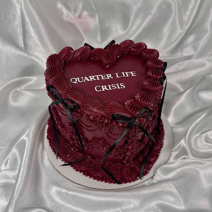 This may contain: a red heart shaped cake with the words quarter life crisis on it's side
