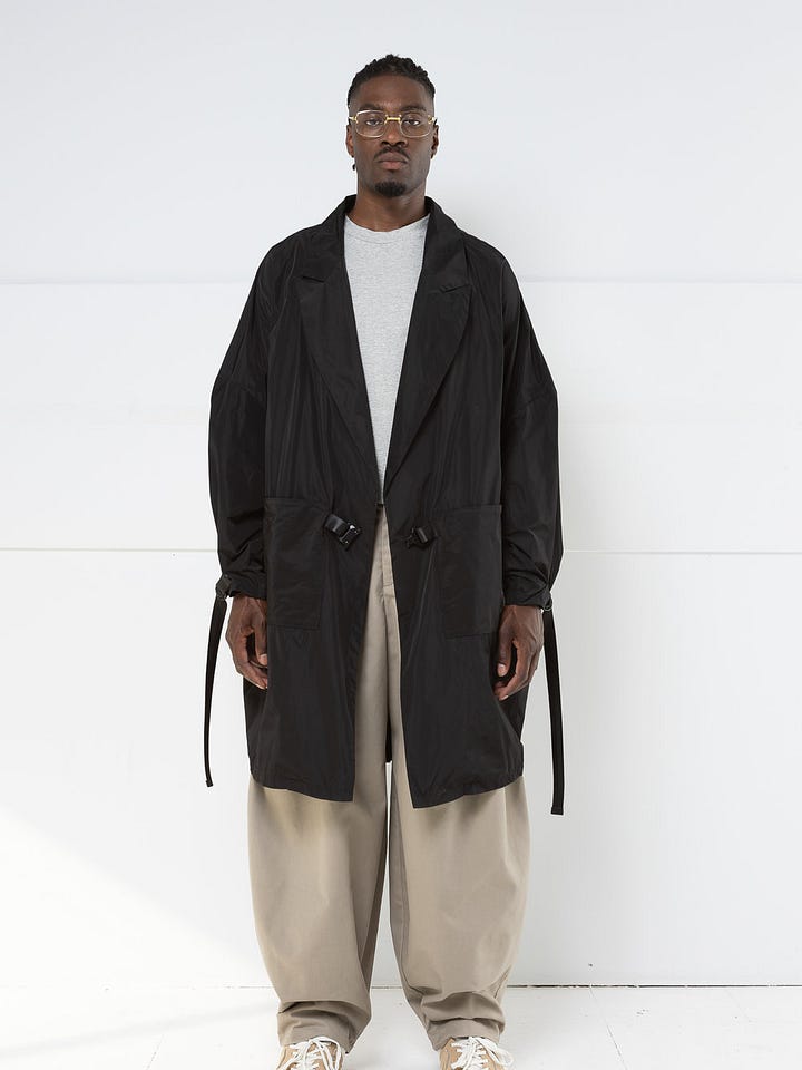 Black oversized nylon jacket with industrial hardware
