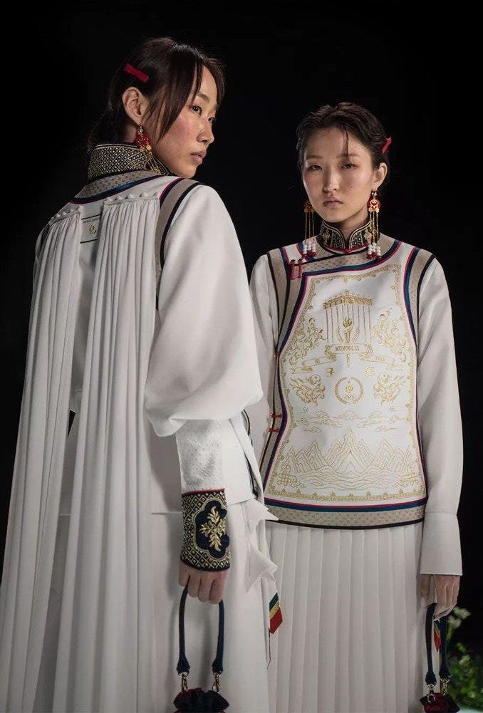 Opening and Closing Ceremony Uniforms by Michel and Amazonka