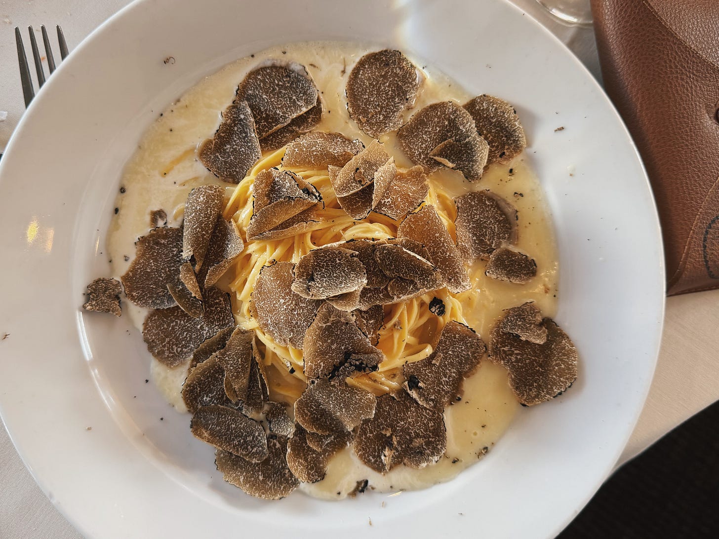 Tagliolini covered with freshly shaved black truffle at Il Pastaio in Beverly Hills.
