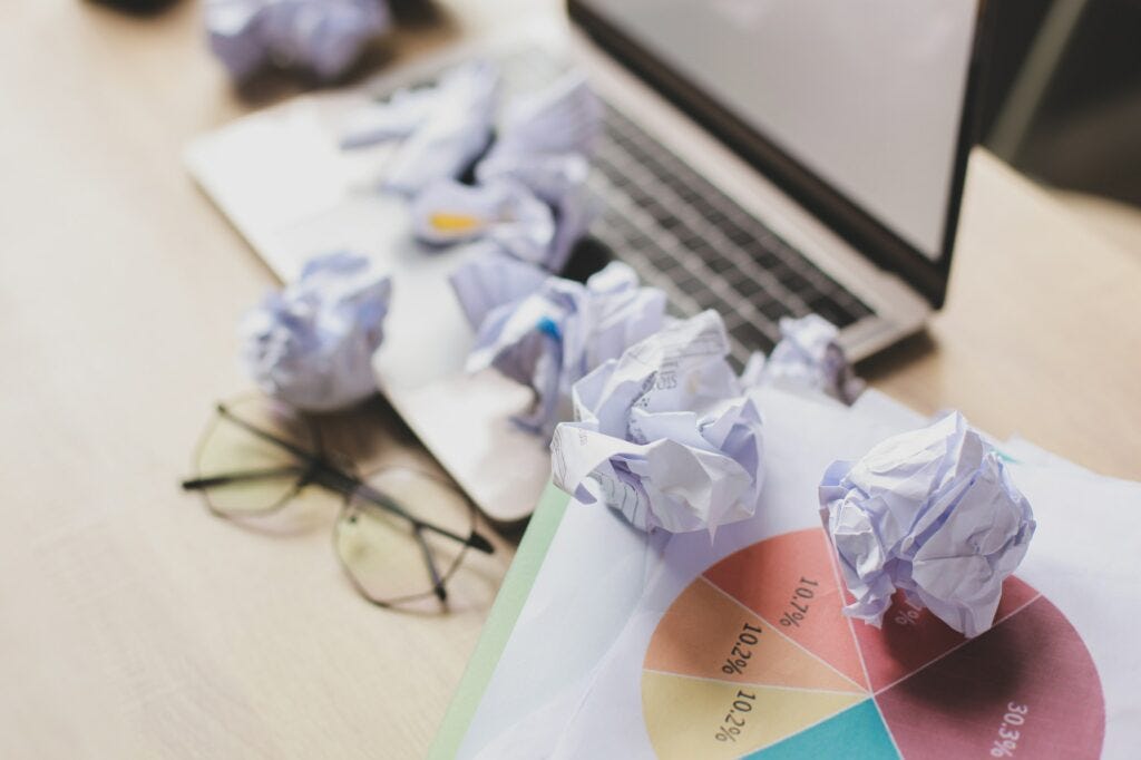 Crumpled papers on office desk