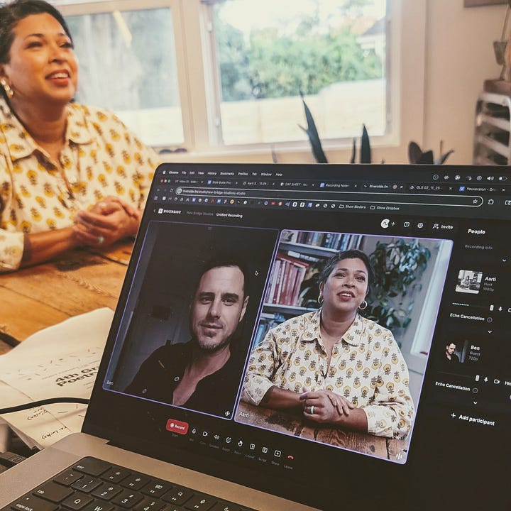 Aarti Sequeira's home kitchen, with Compassion international - dishes at the stove, film crew, food