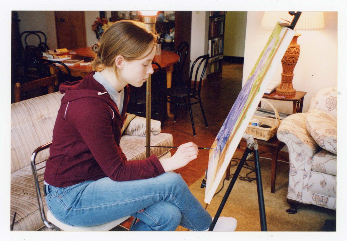 A young K. Woodman-Maynard paints a gift for her grandmother. 