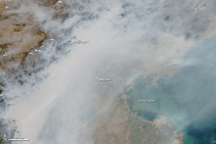 Satellite image of pollution over Beijing. Satellite image of pollution over Beijing.