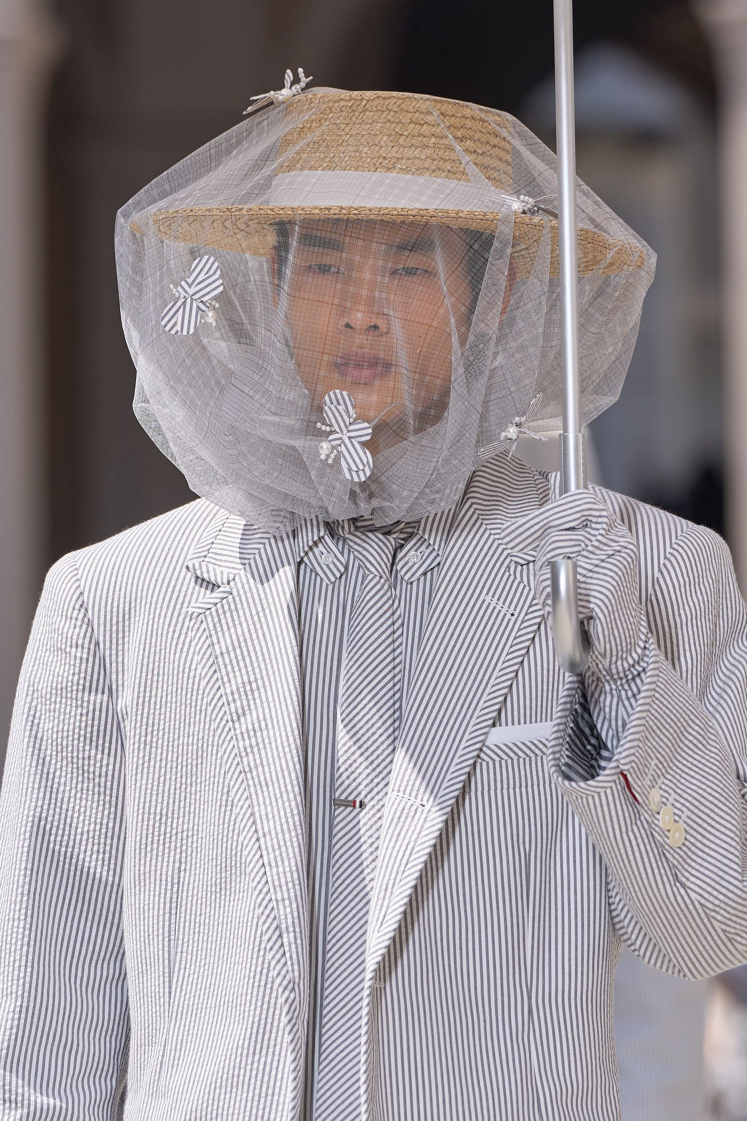 Image may contain Clothing Coat Adult Person Wedding Face and Head Image may contain Clothing Coat Adult Person Wedding Face and Head