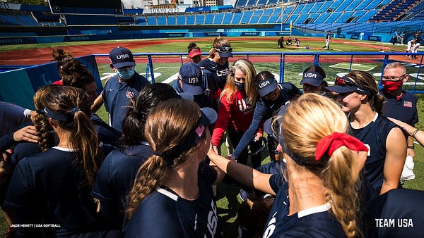 U.S. Olympic softball team in a huddle