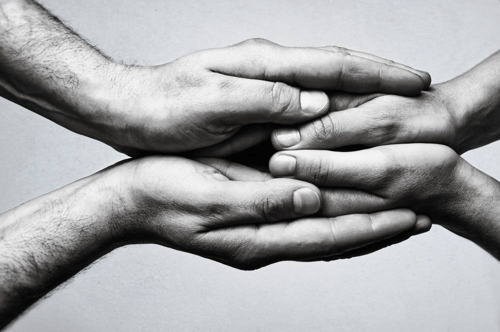 holding hands symbolizing togetherness holding hands symbolizing togetherness